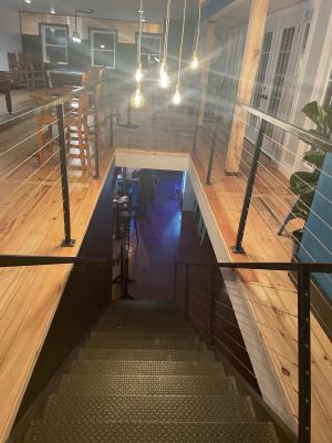 staircase inside the fly taco, custom wire ralings